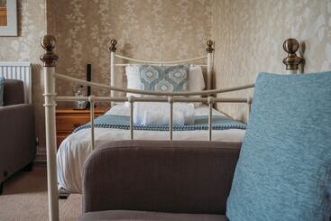 هتل Three Wells B&b