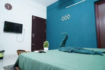هتل Atmos Inn Kozhikode