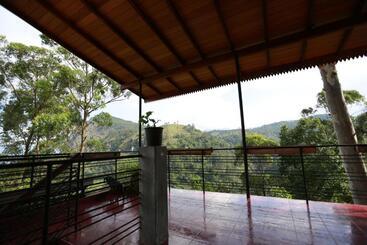 تختخواب و صبحانه Tea Garden Holiday Inn