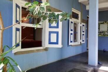 تختخواب و صبحانه Tea Garden Holiday Inn