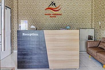 هتل Oyo 91203 Naufal Residence Syariah