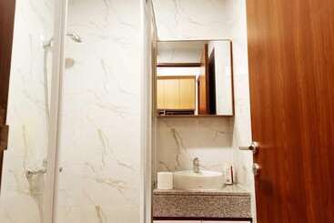 هتل Apartemen Grand Kamala Lagoon By Aparian
