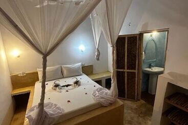 تختخواب و صبحانه Stonefish Inn Jambiani
