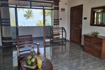 酒店 Dhammika Beach Palace