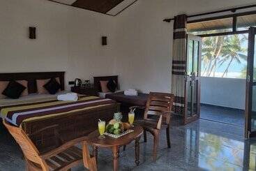 酒店 Dhammika Beach Palace