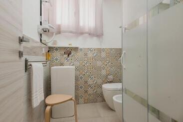 تختخواب و صبحانه Archimede S Rooms