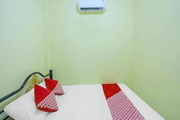 هتل Oyo 91974 Alfisal Syariah