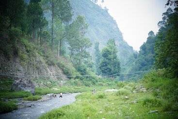 هتل Kainaat A Riverside Homestay
