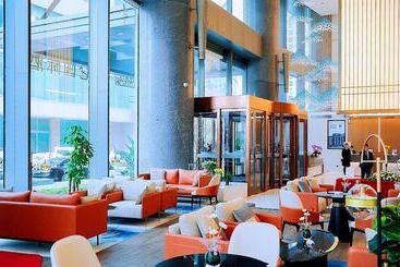 هتل Grand Madison Qingdao Harbourview Central（former Qingdao Farglory ）