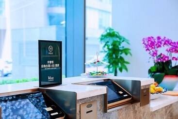 هتل Grand Madison Qingdao Harbourview Central（former Qingdao Farglory ）