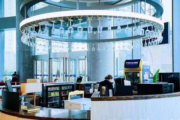 هتل Grand Madison Qingdao Harbourview Central（former Qingdao Farglory ）