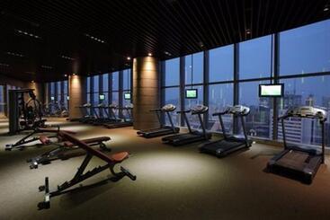 هتل Grand Madison Qingdao Harbourview Central（former Qingdao Farglory ）