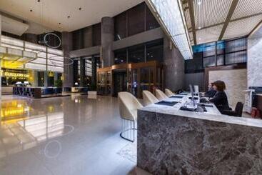 هتل Grand Madison Qingdao Harbourview Central（former Qingdao Farglory ）