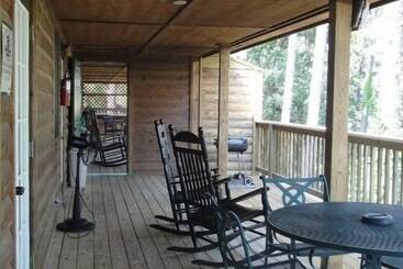 Lake View Two Bedroom, Two Bath Log Sided Cottage With Private Hot Tub Overlooking Lake Ouachita. By