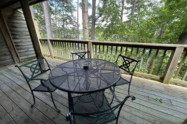 Lake View Two Bedroom, Two Bath Log Sided Cottage With Private Hot Tub Overlooking Lake Ouachita. By