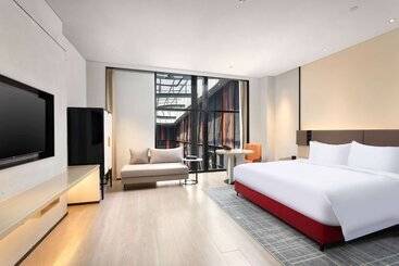 هتل Ramada By Wyndham Huzhou Wuxing