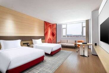 هتل Ramada By Wyndham Huzhou Wuxing