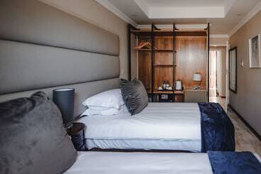 تختخواب و صبحانه The Capital Guest House