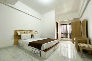 ホテル Oyo 90184 Api Api Guesthouse 533
