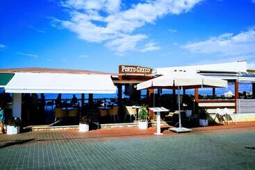 호텔 Porto Greco Village Beach