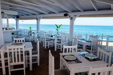 호텔 Porto Greco Village Beach
