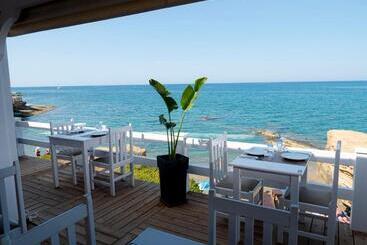 호텔 Porto Greco Village Beach