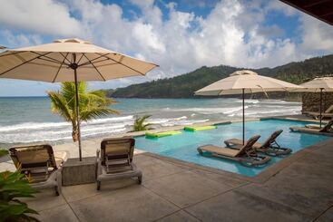 استراحتگاه Pagua Bay House Oceanfront Cabanas