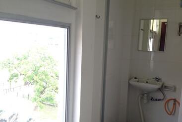 هتل Woodpecker Lodge Kuching