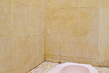 هتل Spot On 92372 Rinda Homestay Syariah & Resto