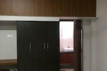 هتل Redbell Suites Residency