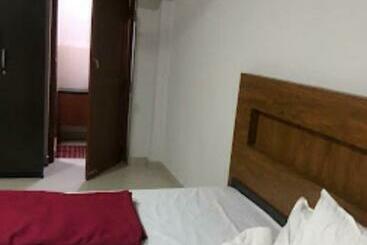 هتل Redbell Suites Residency