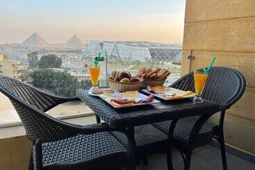 تختخواب و صبحانه Asia Grand Museum & Pyramids View