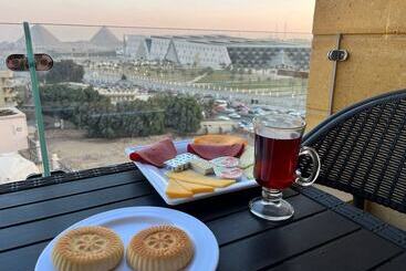 تختخواب و صبحانه Asia Grand Museum & Pyramids View