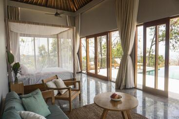استراحتگاه Sanglung Villas & Suites