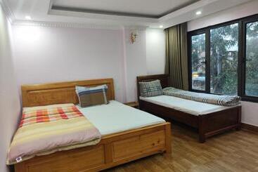 تختخواب و صبحانه Quê Hương House