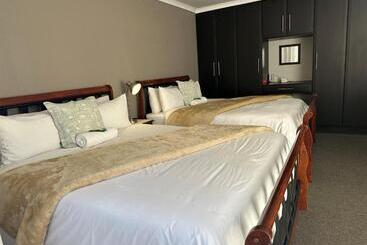 ペンション Fin And Feather Guest Lodge