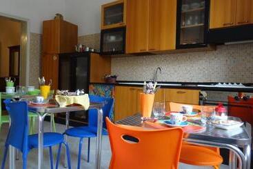 تختخواب و صبحانه Casa Melone Giallo