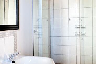 فندق صغير Ashanti Gardens Guesthouse