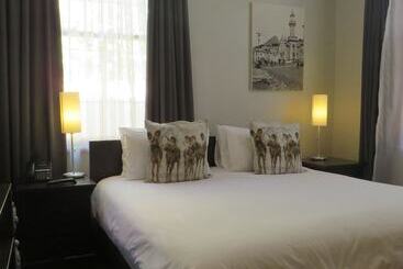 فندق صغير Ashanti Gardens Guesthouse