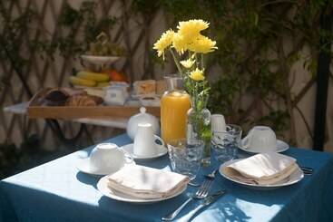 تختخواب و صبحانه Palazzo Bernardini Suites