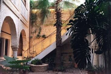 مسافرخانه Boutique Patio Del Posadero