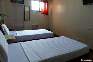 هتل Ruemango Apartelle And Suites