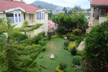 هتل Rainbowcottages