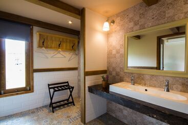 هتل Mela Garden Retreat Cottage