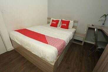 هتل Oyo 92318 Elis Rooms