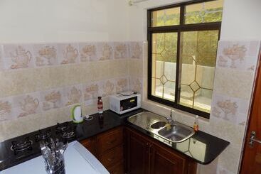 هتل Green Palm Self Catering Apartments And Chalets