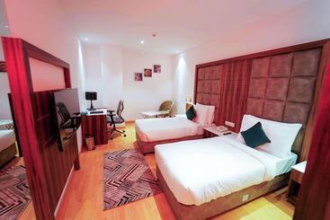 هاستل Quality Inn Elite