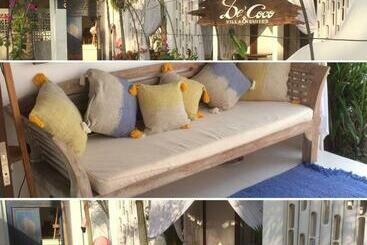 تختخواب و صبحانه De Coco Bungalows