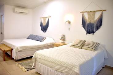 تختخواب و صبحانه Refugio Surf Lodge