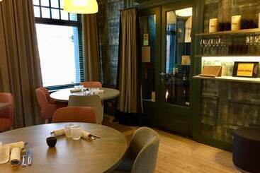هتل Restaurant & Guesthouse Cachet De Cire